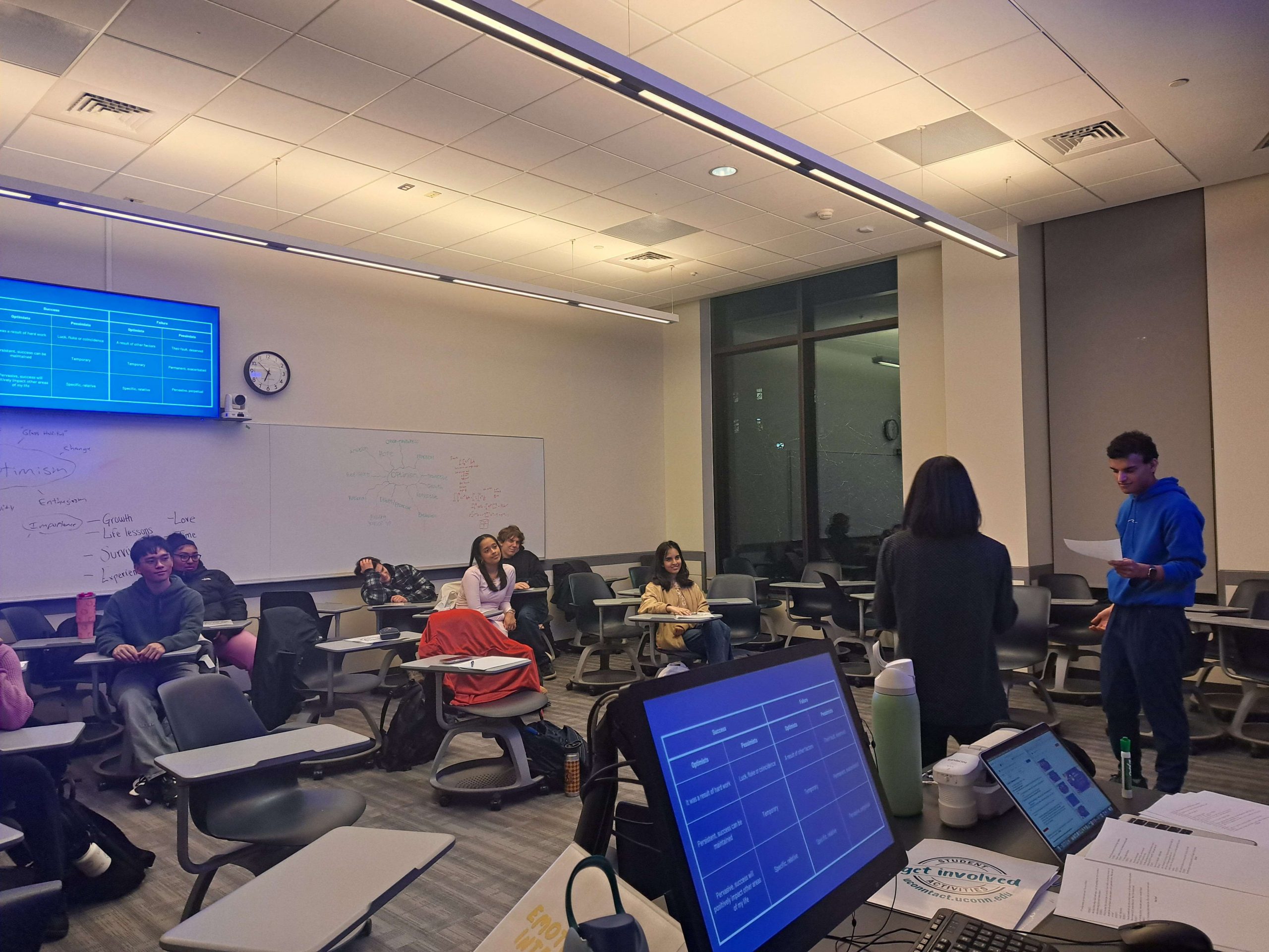 Students engage in conversation with each other during workshop