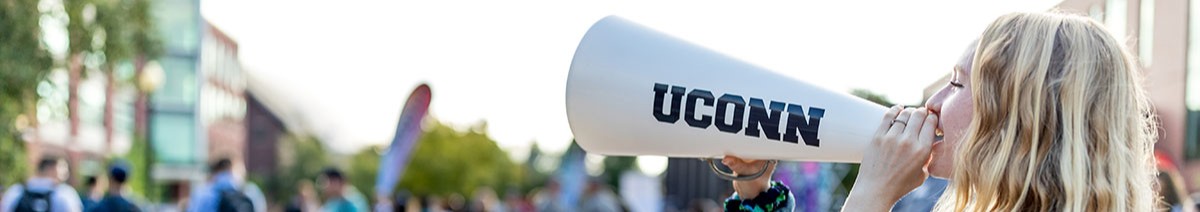 UConn Student at Involvement Fair with Megaphone